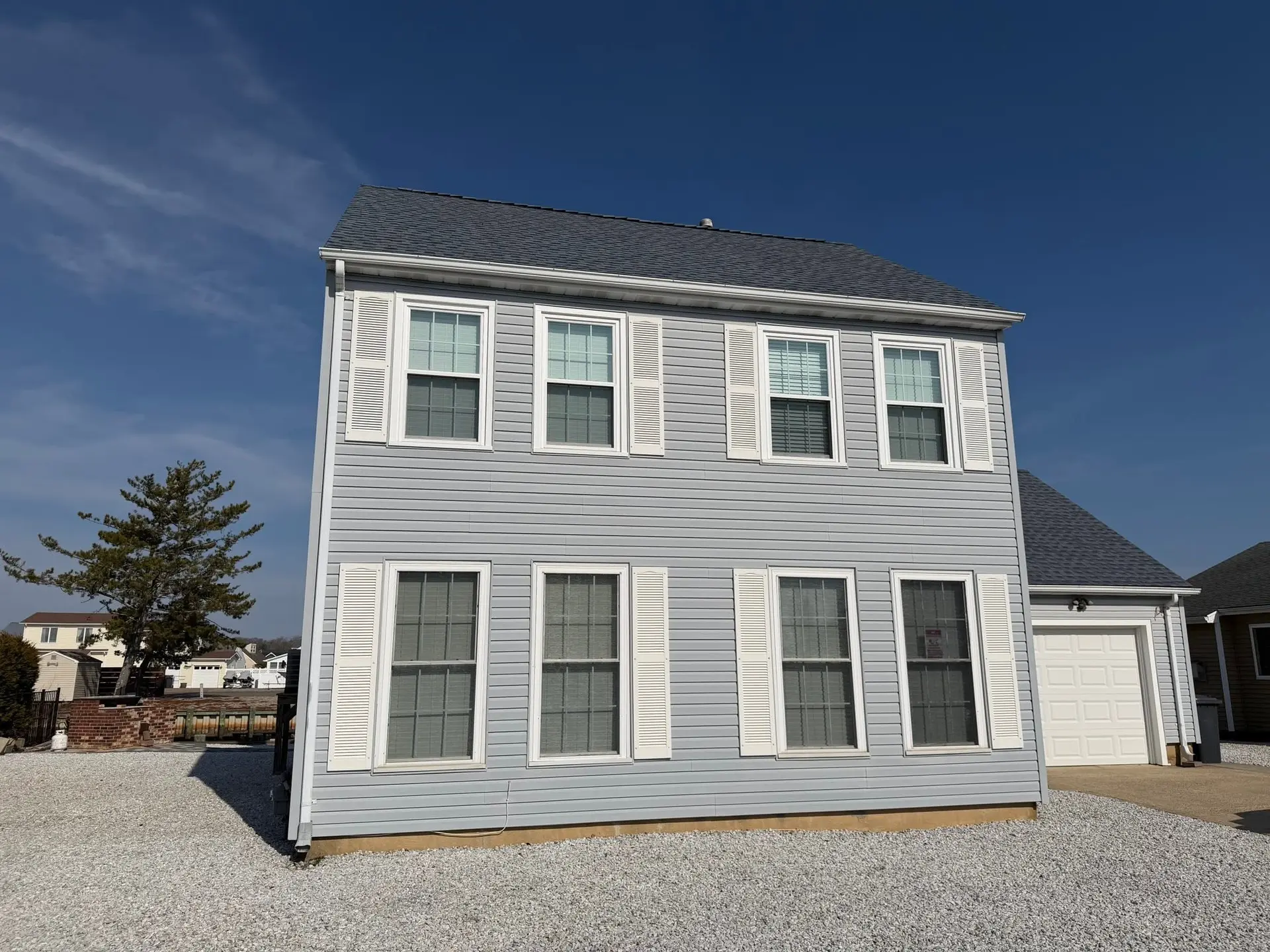 New architectural shingle roof on a two-story coastal New Jersey home