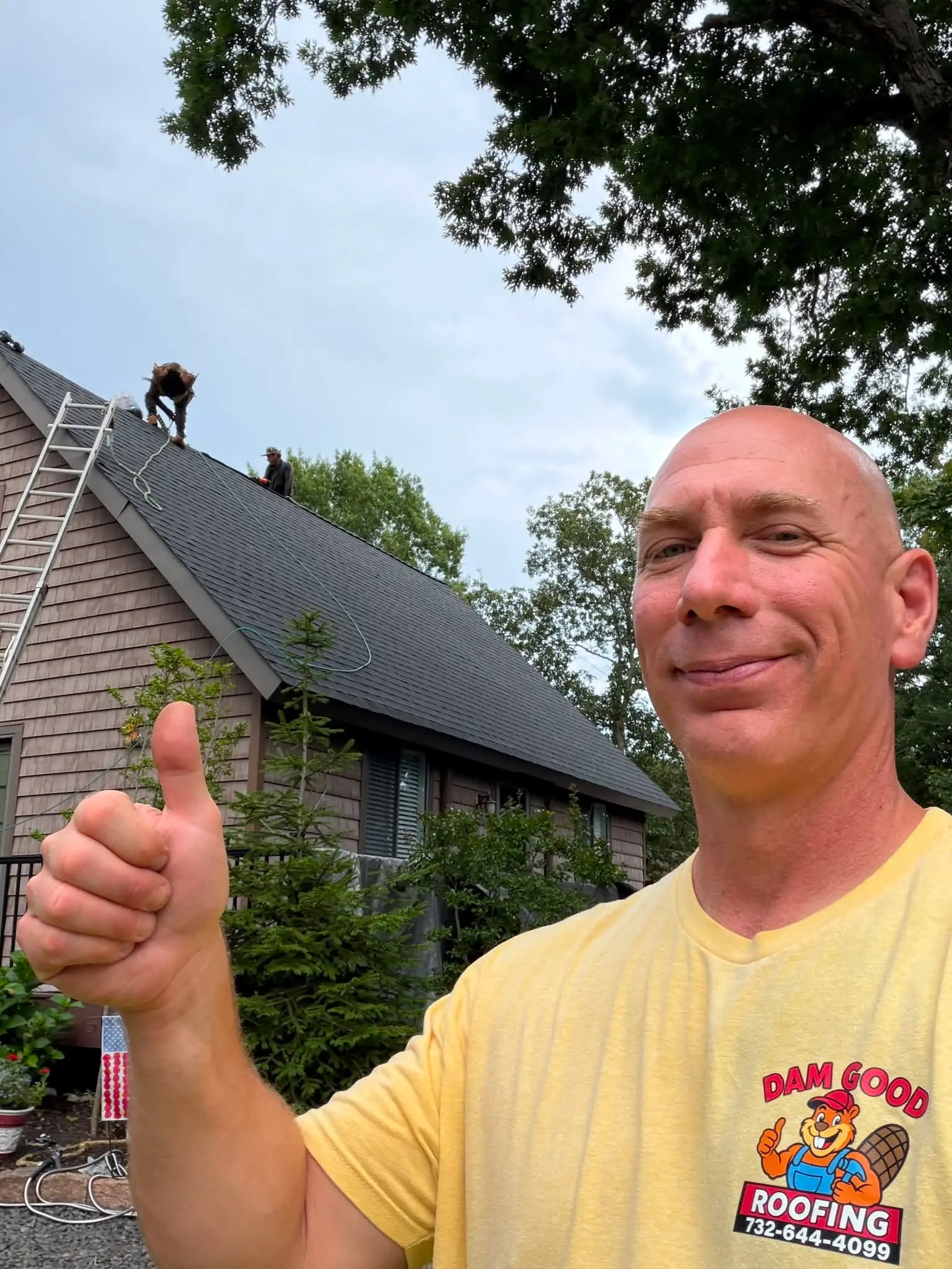 The Dam Good Roofing team on the job