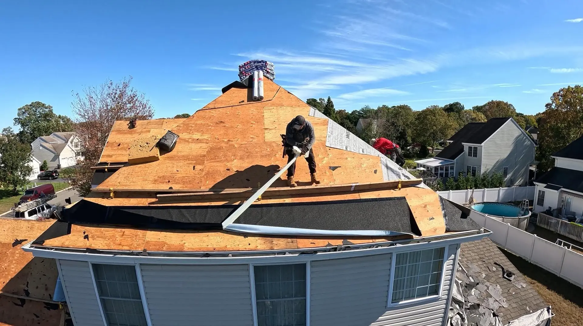 Dam Good Roofing crew installing new decking and underlayment on a Little Egg Harbor, NJ home